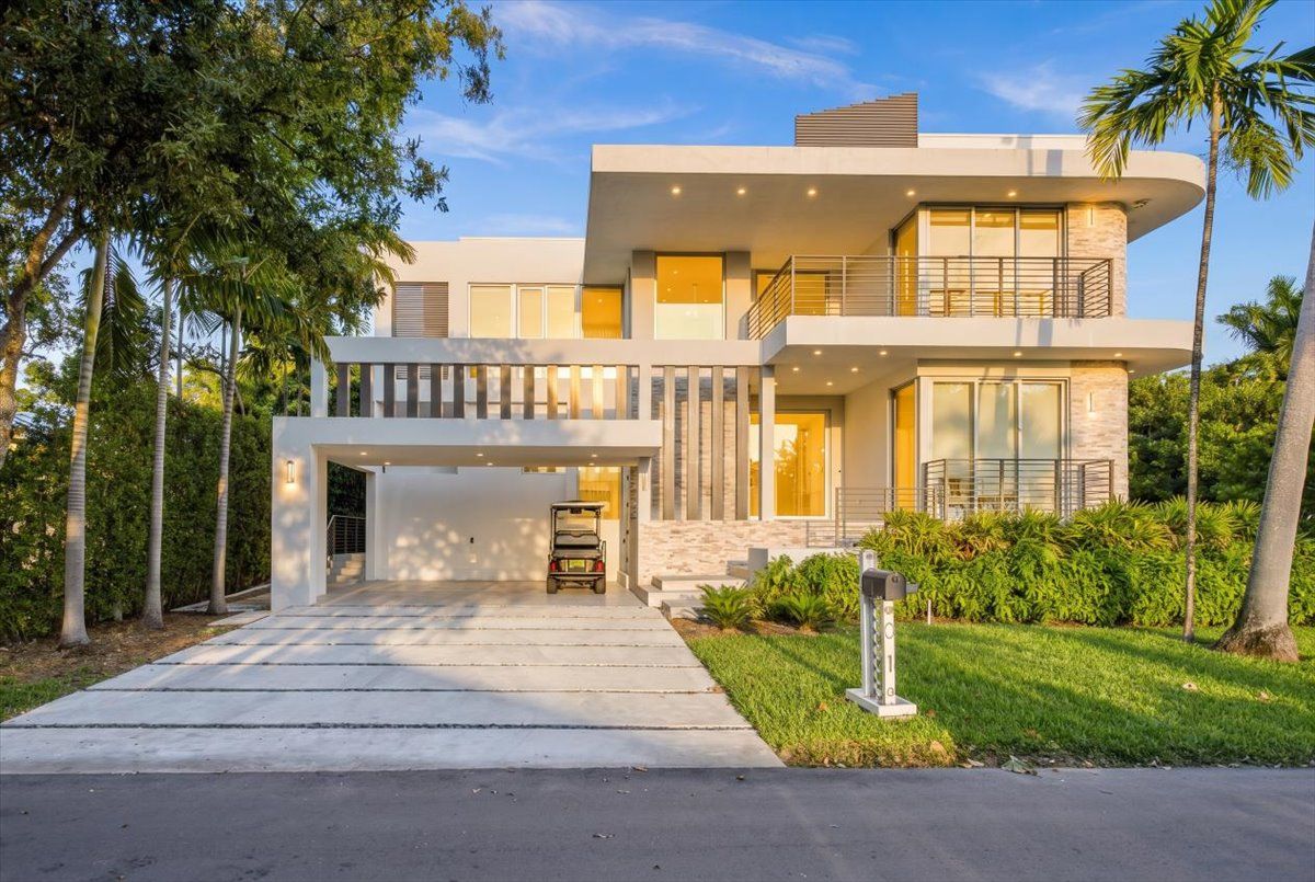 Front elevation of 315 Cypress Drive in golden-hour light