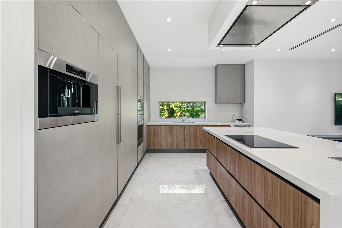 Built-in Wolf coffee system and full-height cabinetry